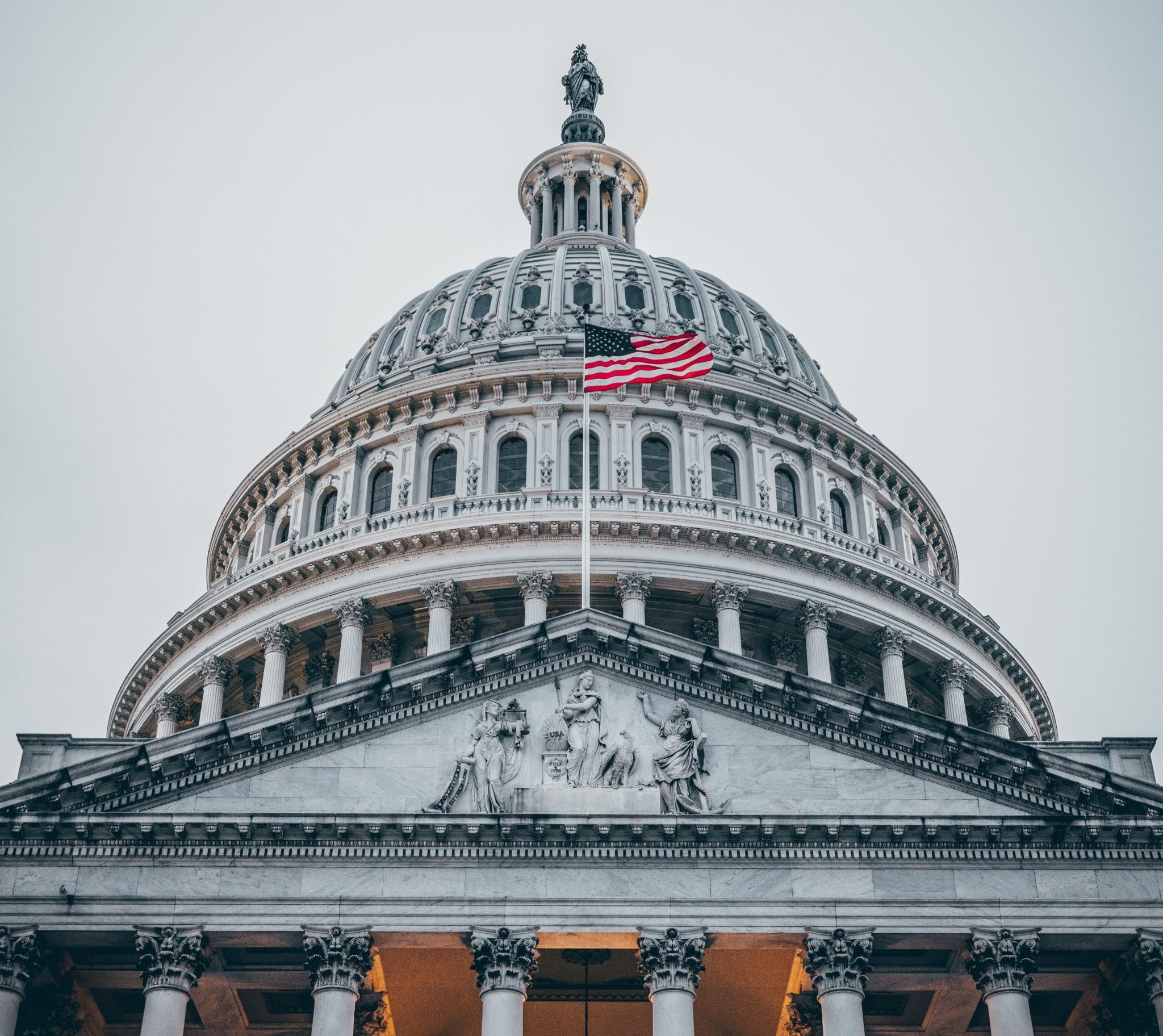 The U.S. Capitol building with American flag